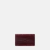 Clutch Medusa 95 cu efect de crocodil