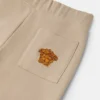 Pantaloni de trening din bumbac brodați pentru copii Pantaloni de trening din bumbac brodați pentru copii