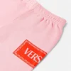 Pantaloni de trening pentru copii cu logo vintage din anii ’90 Pantaloni de trening pentru copii cu logo vintage din anii ’90