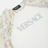 Pijama din bumbac jersey cu imprimeu pentru bebeluși Pijama din bumbac jersey cu imprimeu pentru bebeluși