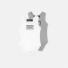 Set de 2 body-uri din bumbac cu nervuri pentru bebeluși Set de 2 body-uri din bumbac cu nervuri pentru bebeluși