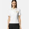 Tricou polo cu emblemă în V Tricou polo cu emblemă în V