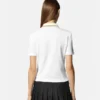 Tricou polo cu emblemă în V Tricou polo cu emblemă în V